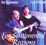 Kai Heumann in suit with jazz guitar and the Chinese singer Lei Errenst
